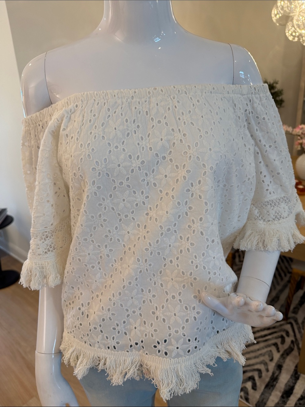 Off-Shoulder Eyelet Fringe Top — Cream